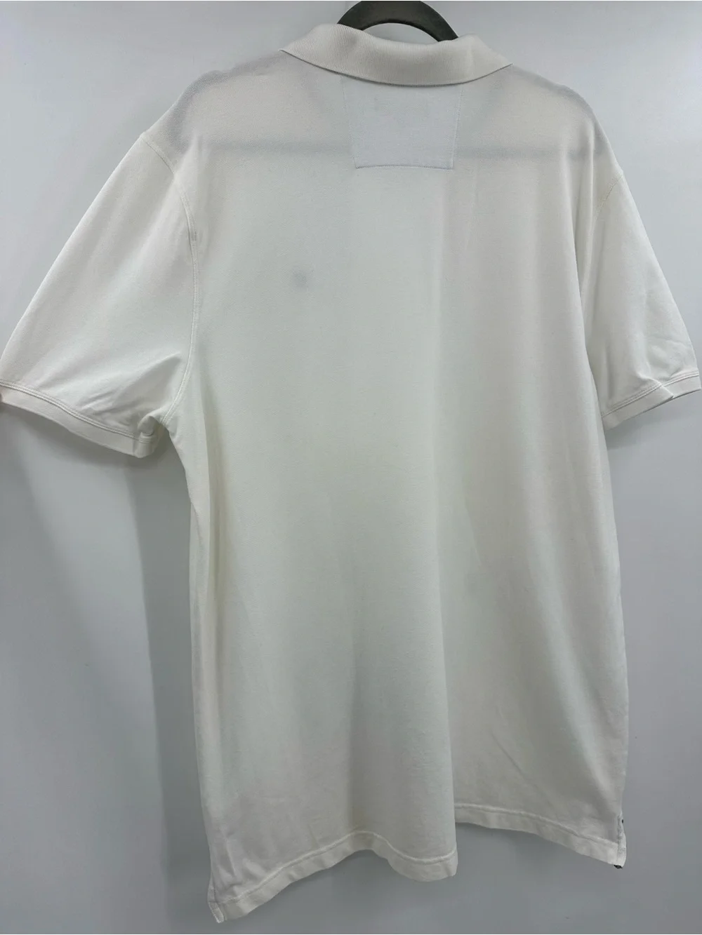 Banana Republic White Polo with Subtle Elephant Logo
